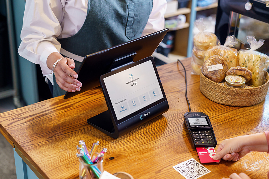 Employee using POS terminal